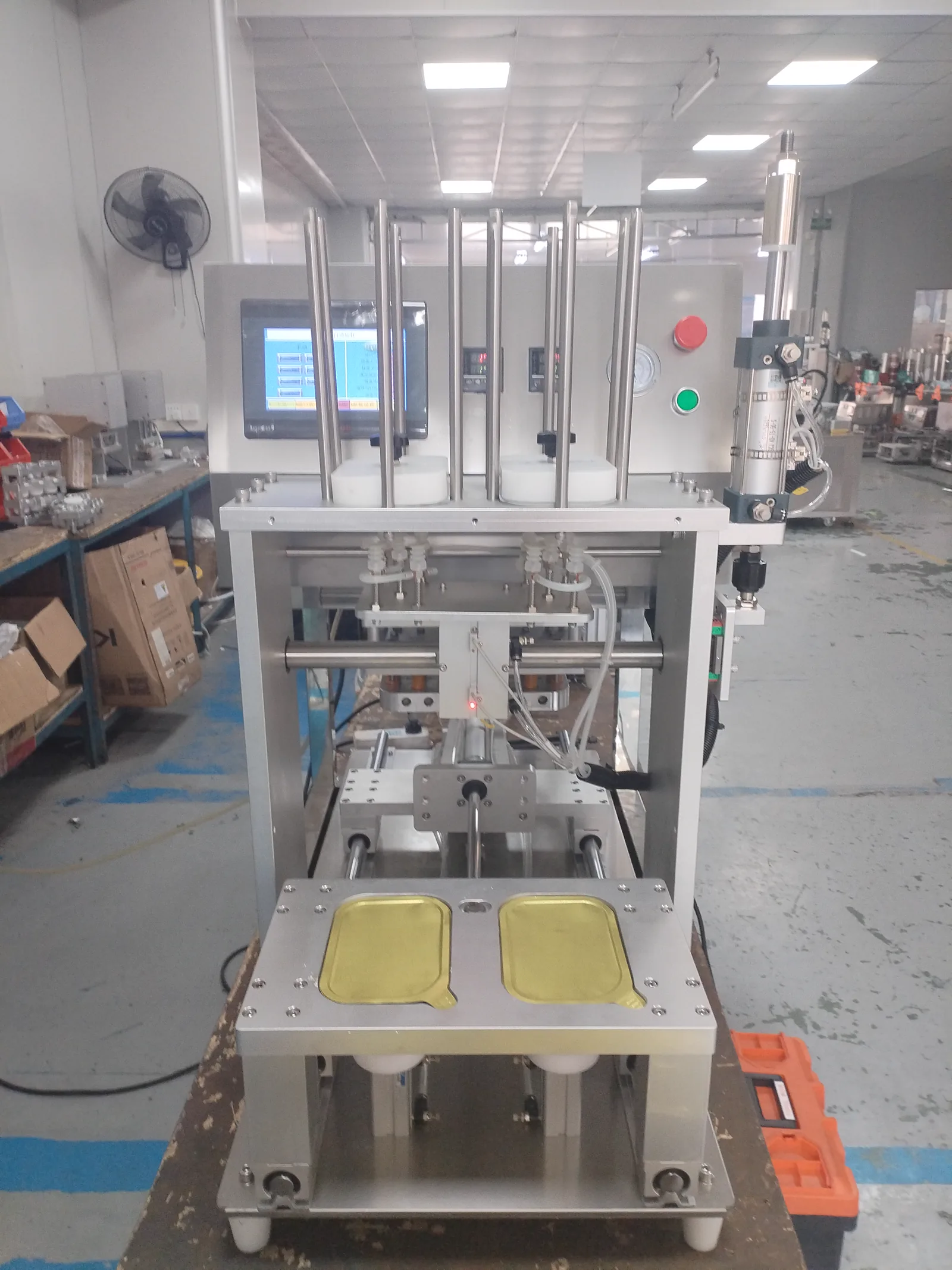 Automatic pre-cut film pick-and-place tray sealing machine