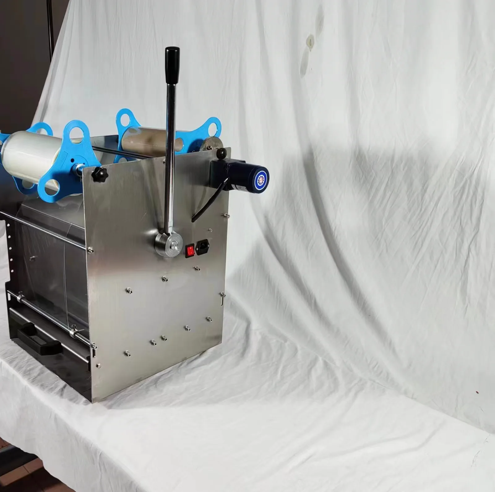 Side view of the handle press and sliding tool table