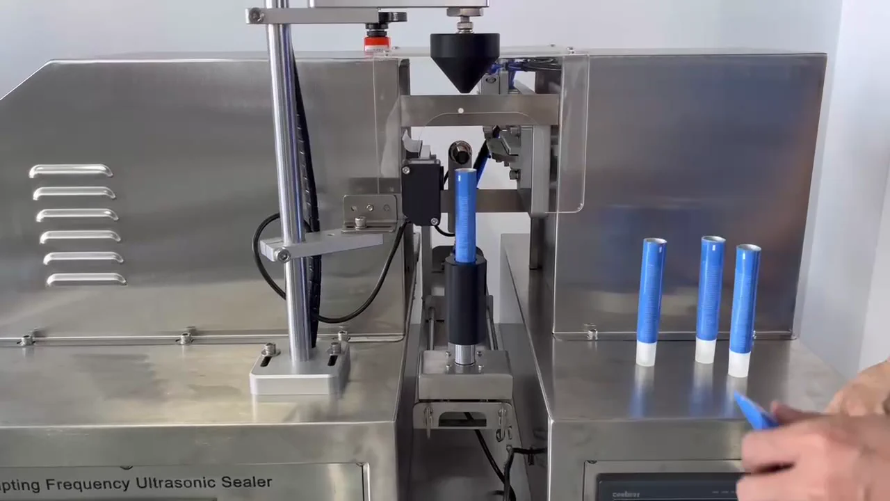 Ultrasonic Tube End Sealer and Coder · Tube positioning