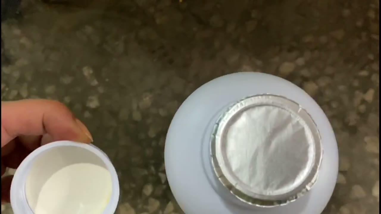 Continuous bottle-line induction sealing video