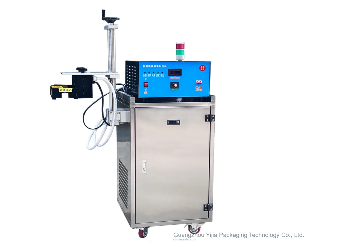 Separate cabinet and suspended head of a water-cooled induction cap sealer
